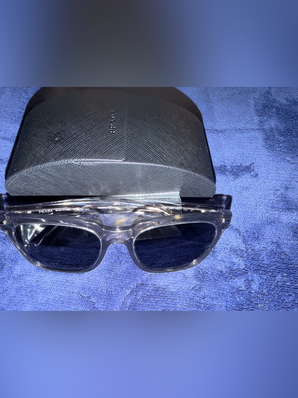 Prada Men’s Clear Frame Sunglasses with Black Lenses